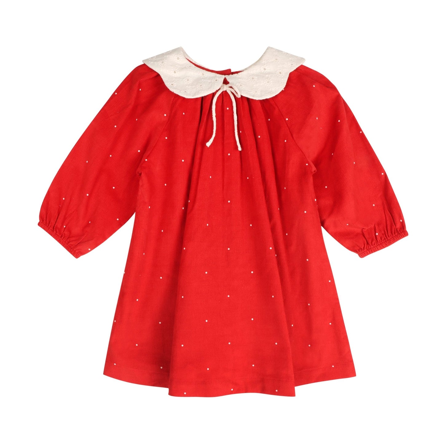 Flat lay view of the LARILI Christmas Carol Red Holiday Dress showing the tiny dot print, 100% cotton corduroy texture.
