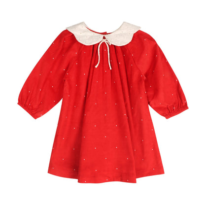 Flat lay view of the LARILI Christmas Carol Red Holiday Dress showing the tiny dot print, 100% cotton corduroy texture.