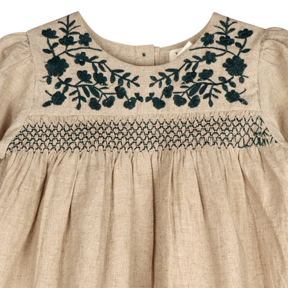 Girls' Meadow Breeze natural linen dress with floral embroidery and smocking. Handcrafted artisan clothing by LARILI."